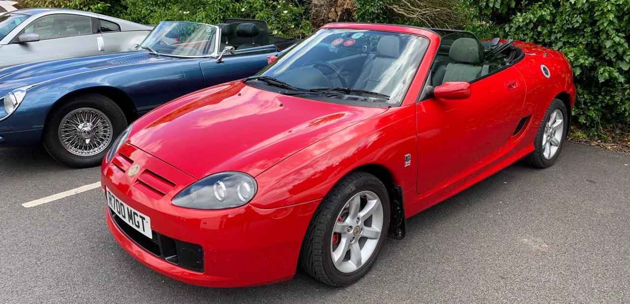 Red MG TF displayed at a Club RetroTorque gathering
